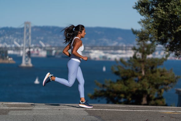 woman running on the road